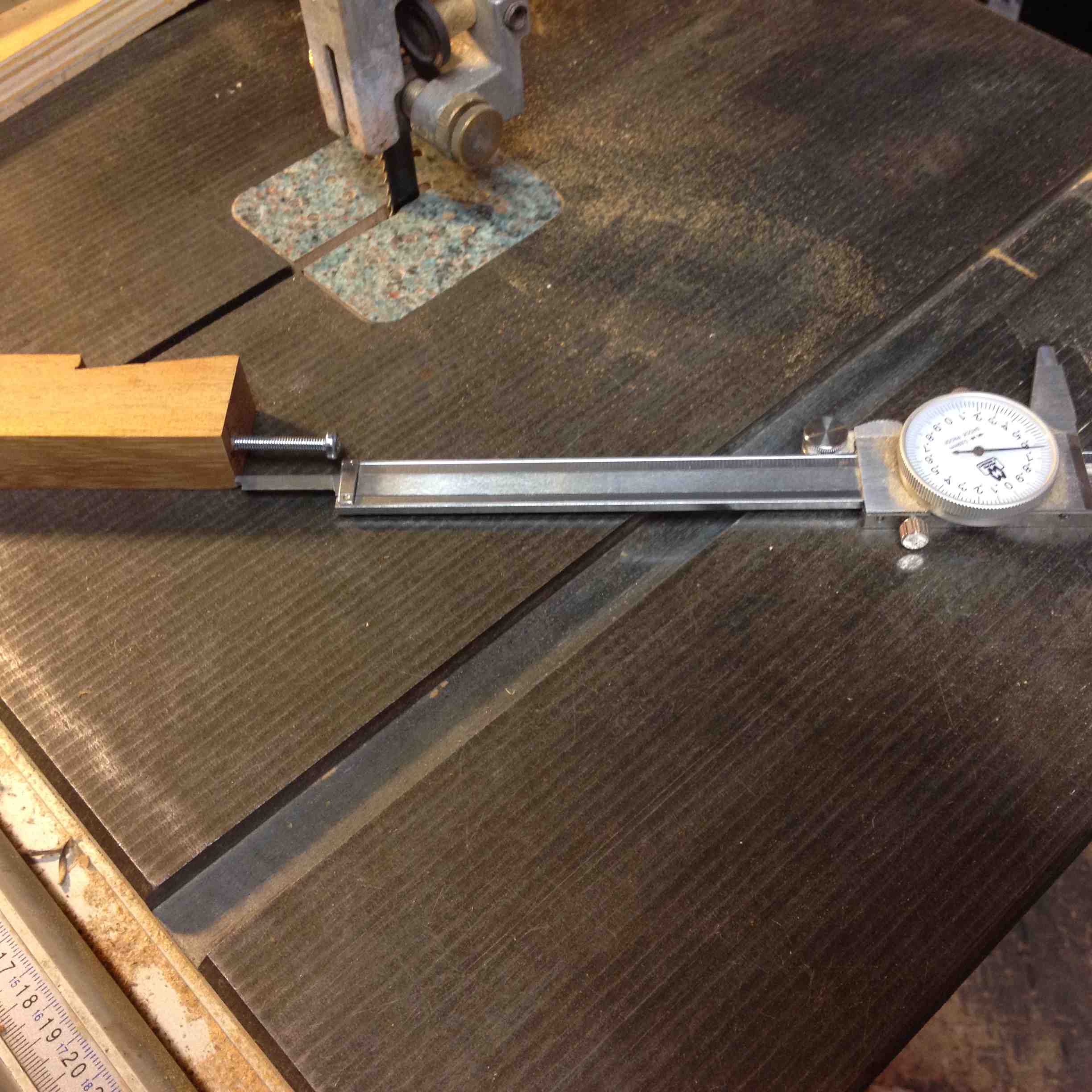 End spacer with bolt for adjustment